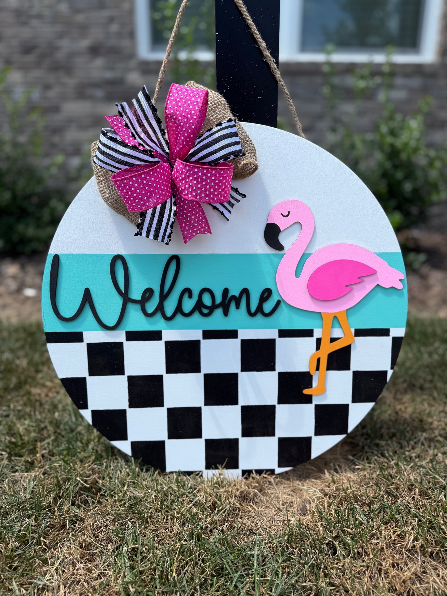Welcome Checkered Flamingo Door Hanger
